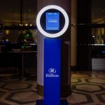 Presto booth customized with Hilton branding for a corporate hotel event